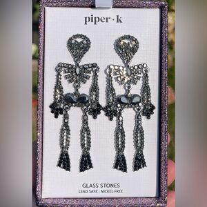 Cool sparkling Piper.k Skeleton stud earrings for Halloween 🎃